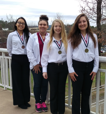 Pictured left to right are Bianca Rodriguez, Sarai Sharif, Katelyn Ostrem and Kirstie Pennington with their medals.