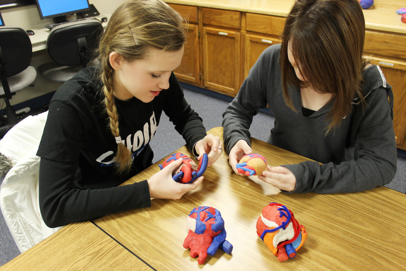 Two students looking at health science technology