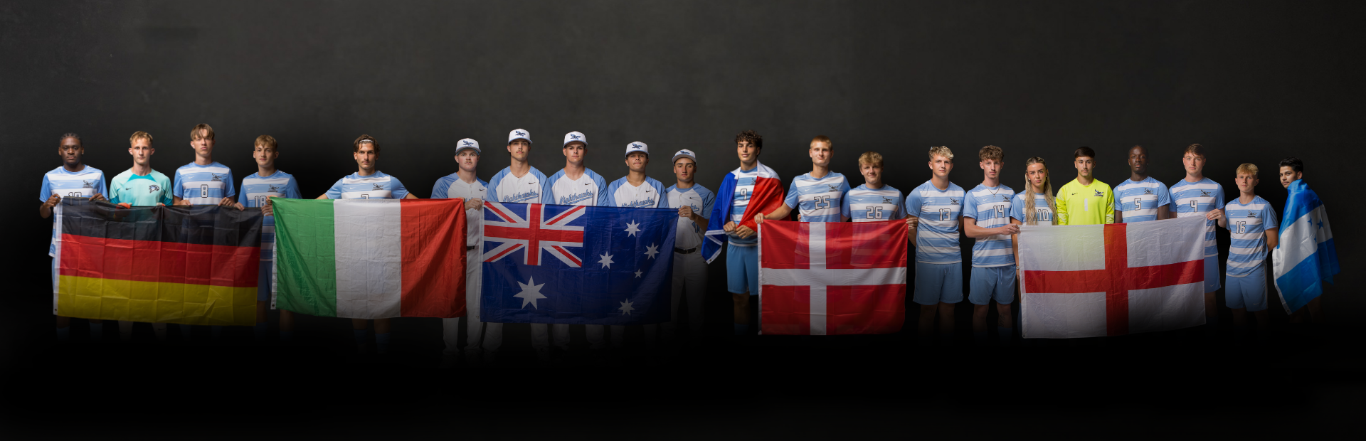 Groups of student athletes holding their native flags