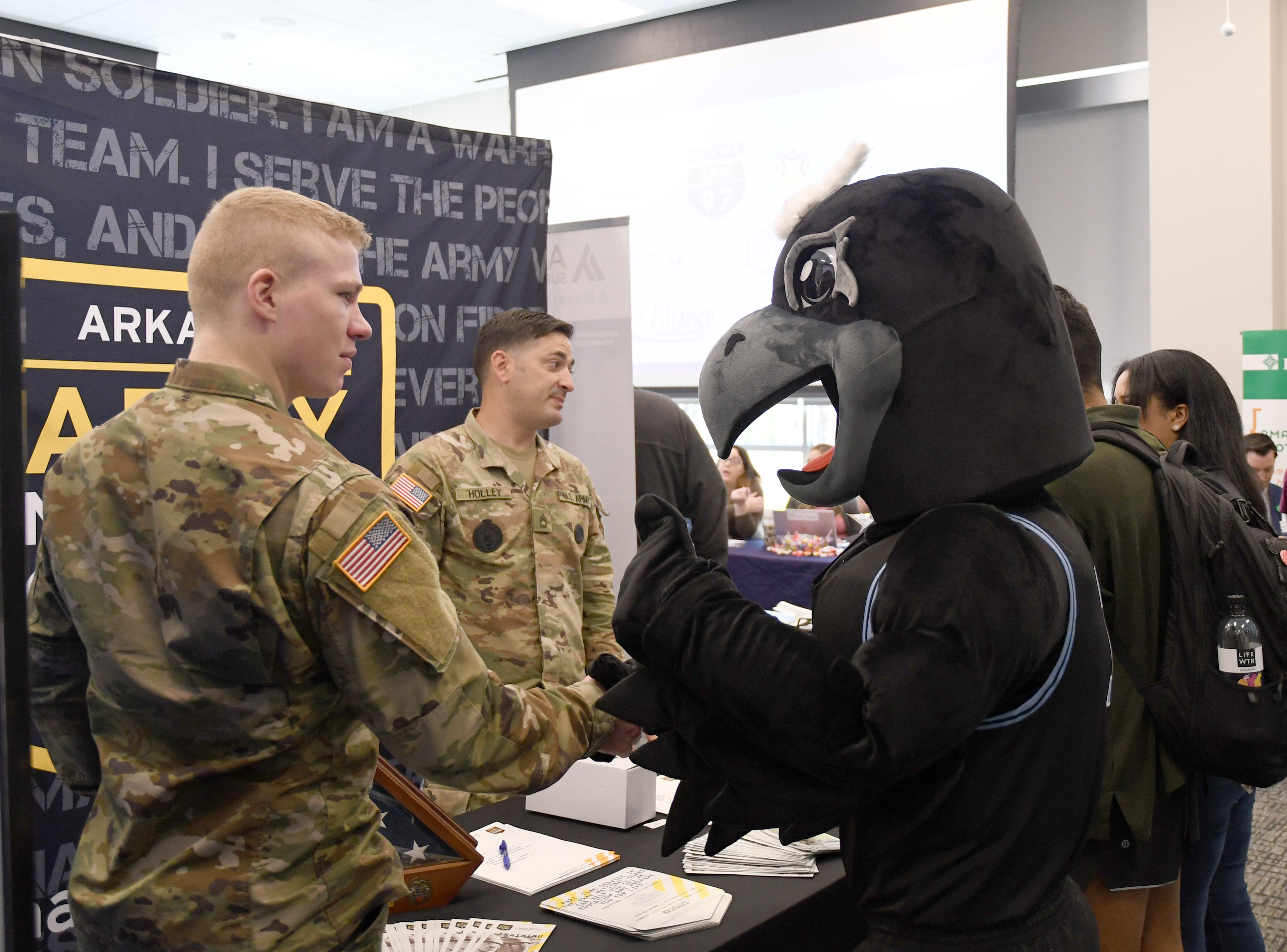 Mascot at the army booth at a job fair