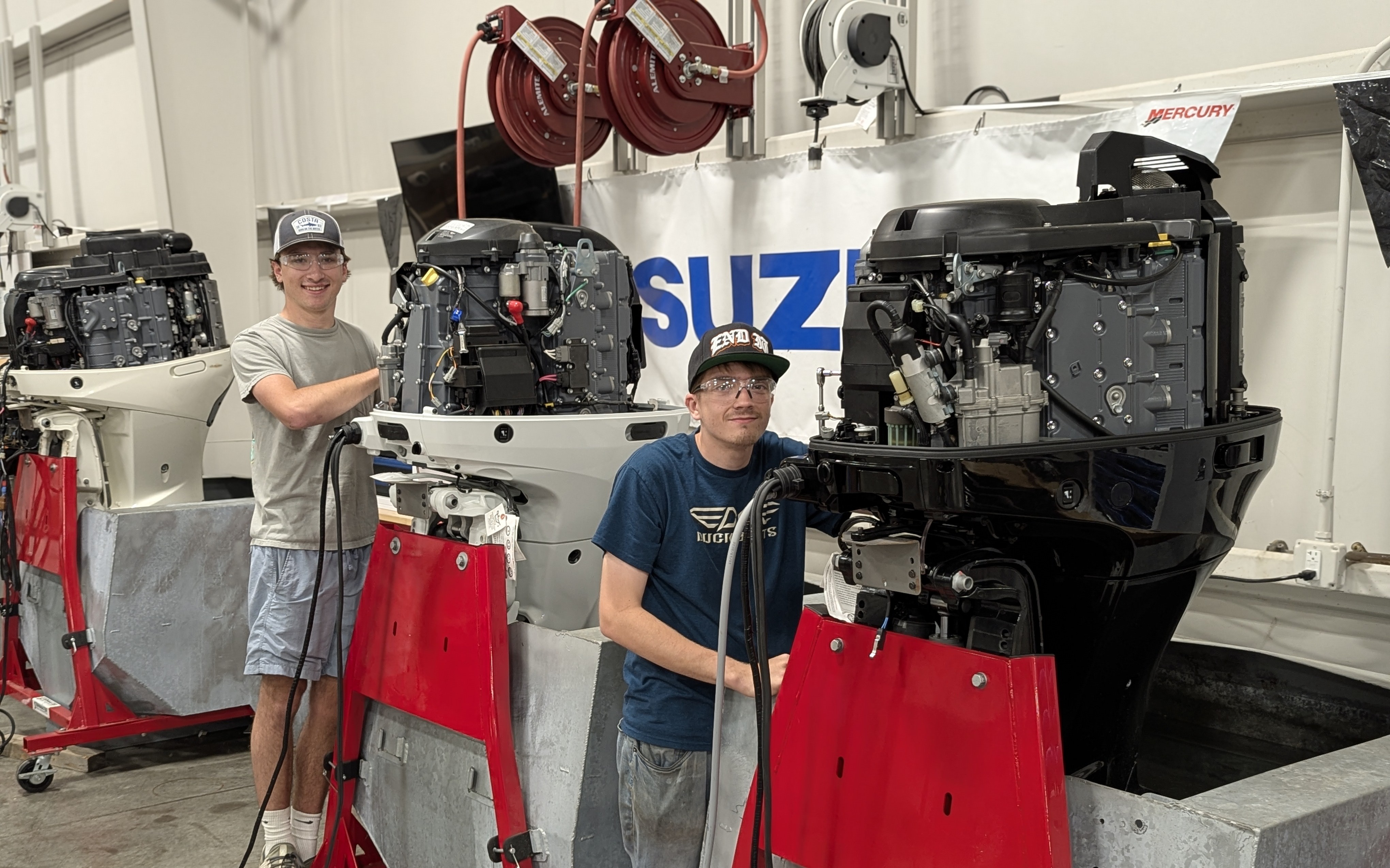Marine Repair Technology students working in a shop