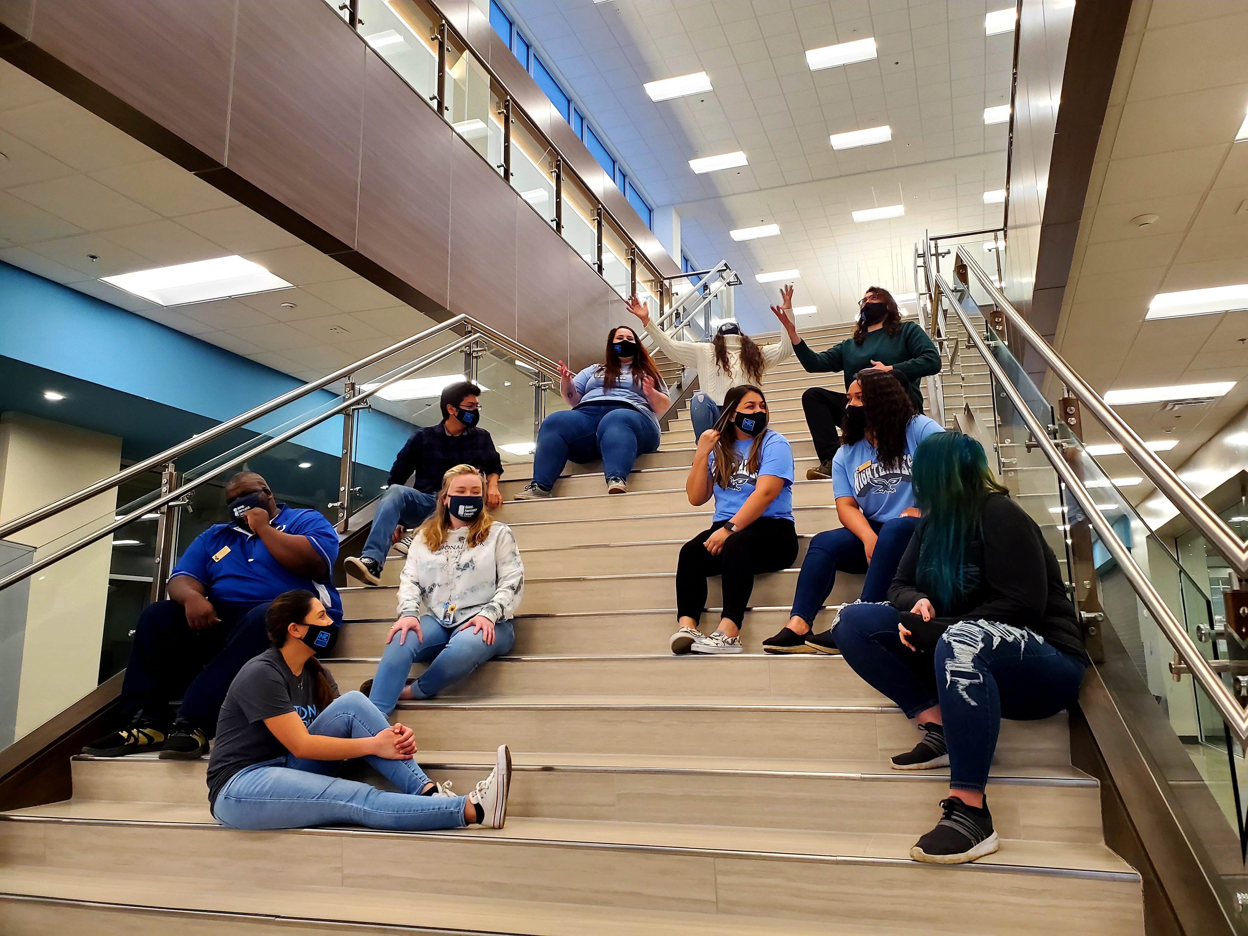 Students sitting on staircase