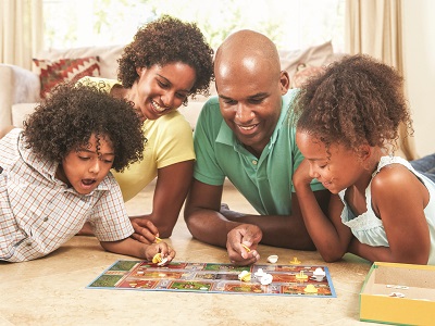 Family playing a board game