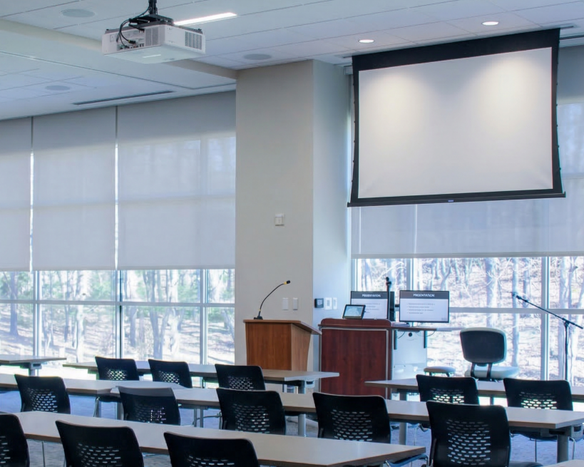 Conference room with projector and speaking station