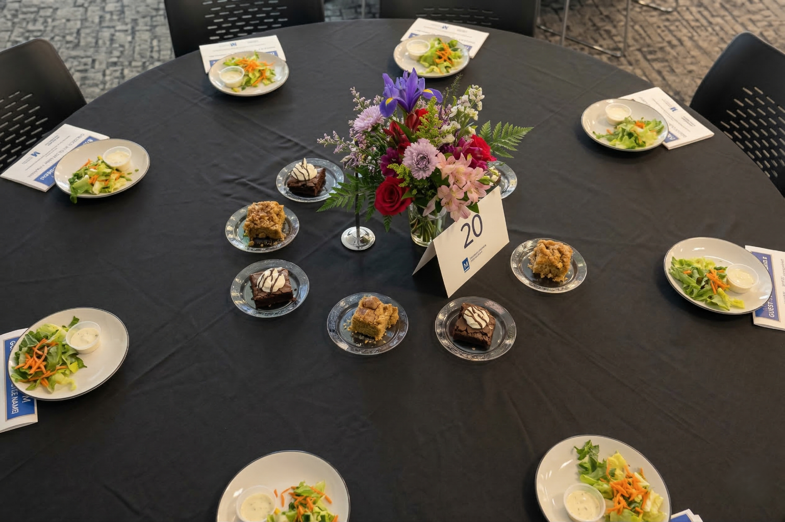 Food and place settings at a round table