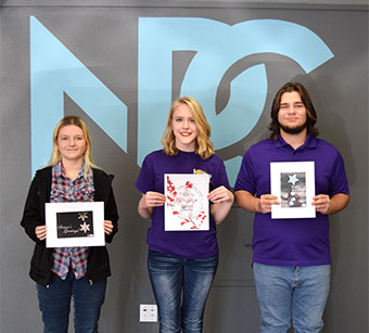 National Park Technology Centers high school advertising and design students competed to design the annual NPC Christmas card. Pictured are the winners and their creations.