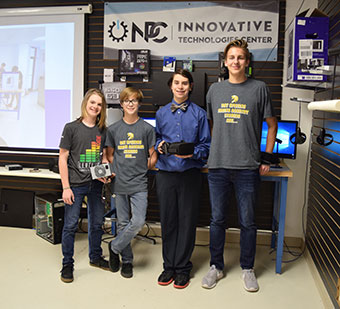 National Park College (NPC) Innovative Technologies Center (ITC) hosted Hot Springs Junior Academy (HSJA) Environmental and Spatial Technologies (EAST) students Tuesday as they presented a custom built computer to run the ITC’s Oculus Rift virtual reality system. 