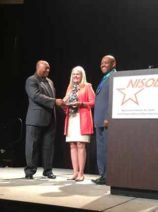 Pictured is Janet Brewer, vice president for human resources accepting NPC’s award at the 2018 NISOD conference. 