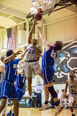 DJ Martin going for a basket against Williams College