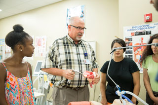 Paul Lowe, Respiratory Faculty, with students at National Park College.