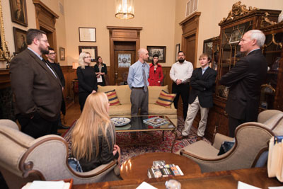 NPC students visiting with Asa Hutchinson in his personal office at the state capitol.