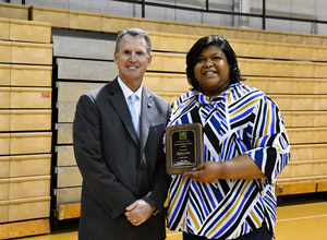 Kristy Carter receiving the Outstanding Alumnus award