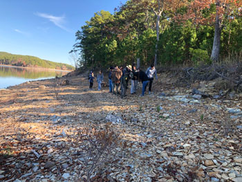 Pictured are students looking for fossils on Checkerboard Island. Photo by Bradley McMichael.