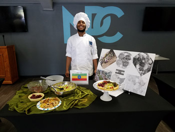 NPC hospitality student, Jarvis, presenting his international cuisine