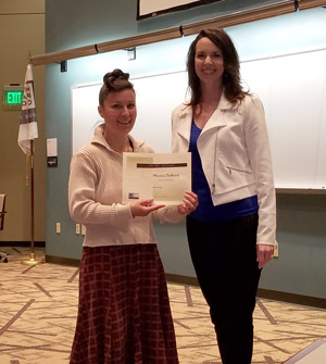 NPC student Monica Tedford and faculty Jennifer Lyons. Tedford is receiving an award from the Business Department at NPC.