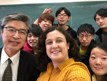 NPC student, Abby Hanks, taking a selfie with students and faculty at Fuji University in Hanamaki, Japan.