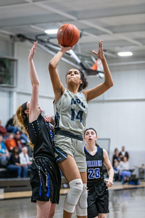 Nya Moody going up for a shot against the Eagles.