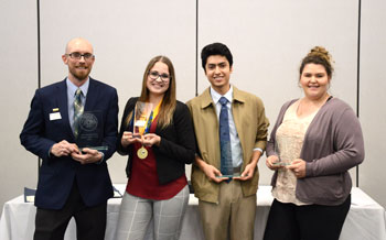 Cory Morris, Marie Linden-Cox, Edgar Ceja, and Lexie Sisson, the 2019-2020 officers of PTK holding their awards.