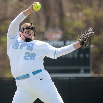 During a game, Makenna Keeton winds up for a pitch.