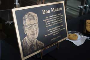 Plaque titled Don Munro with a picture of his face.
