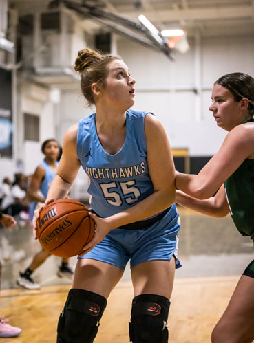 Landrey Richardson guards the basketball from opponent