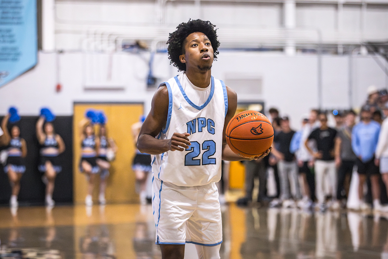 Shamir Caruthers preparing for a free throw