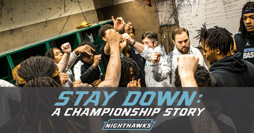 Stay Down: A Championship Story. National Park College Nighthawks. Basketball players and coaches fist bumping each other in the locker room.