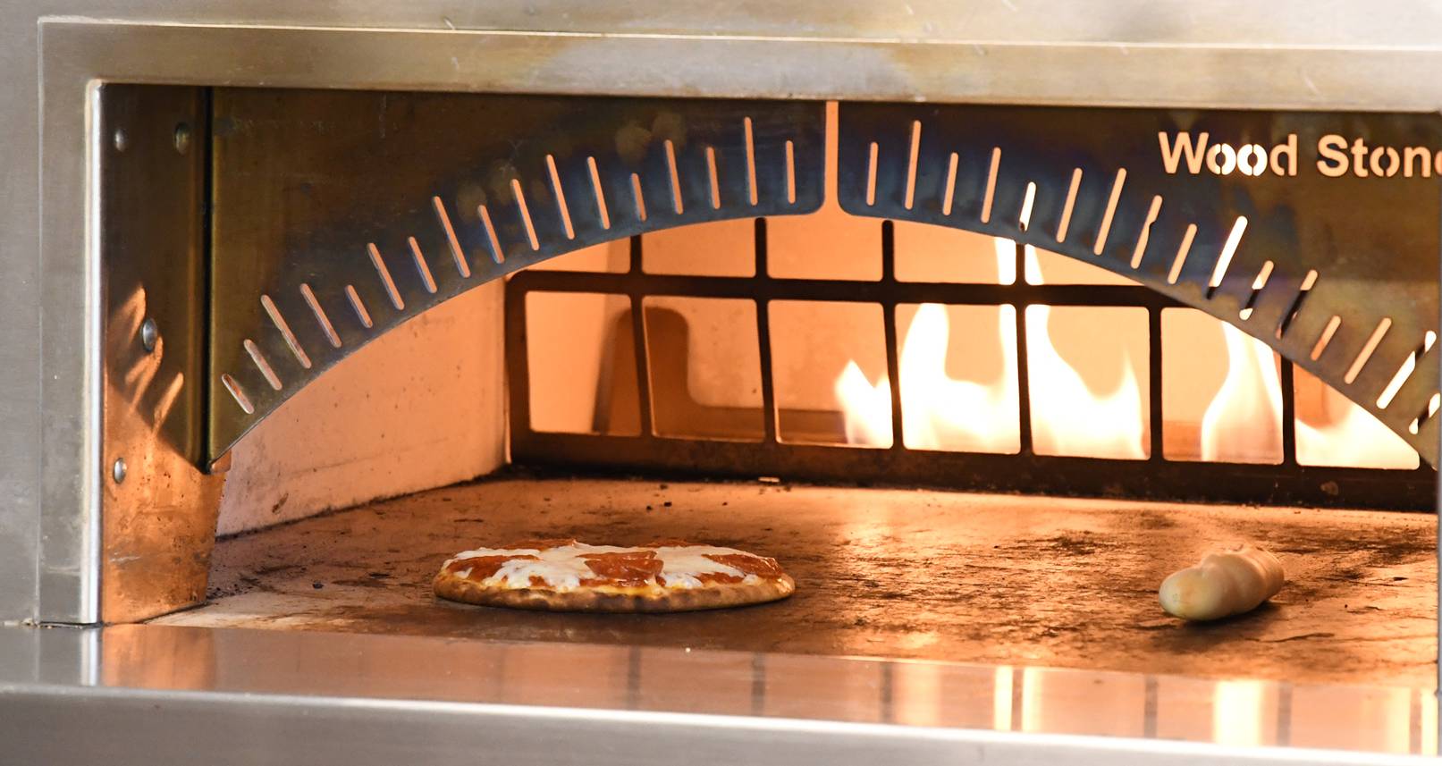 Pizza in a wood fire grill