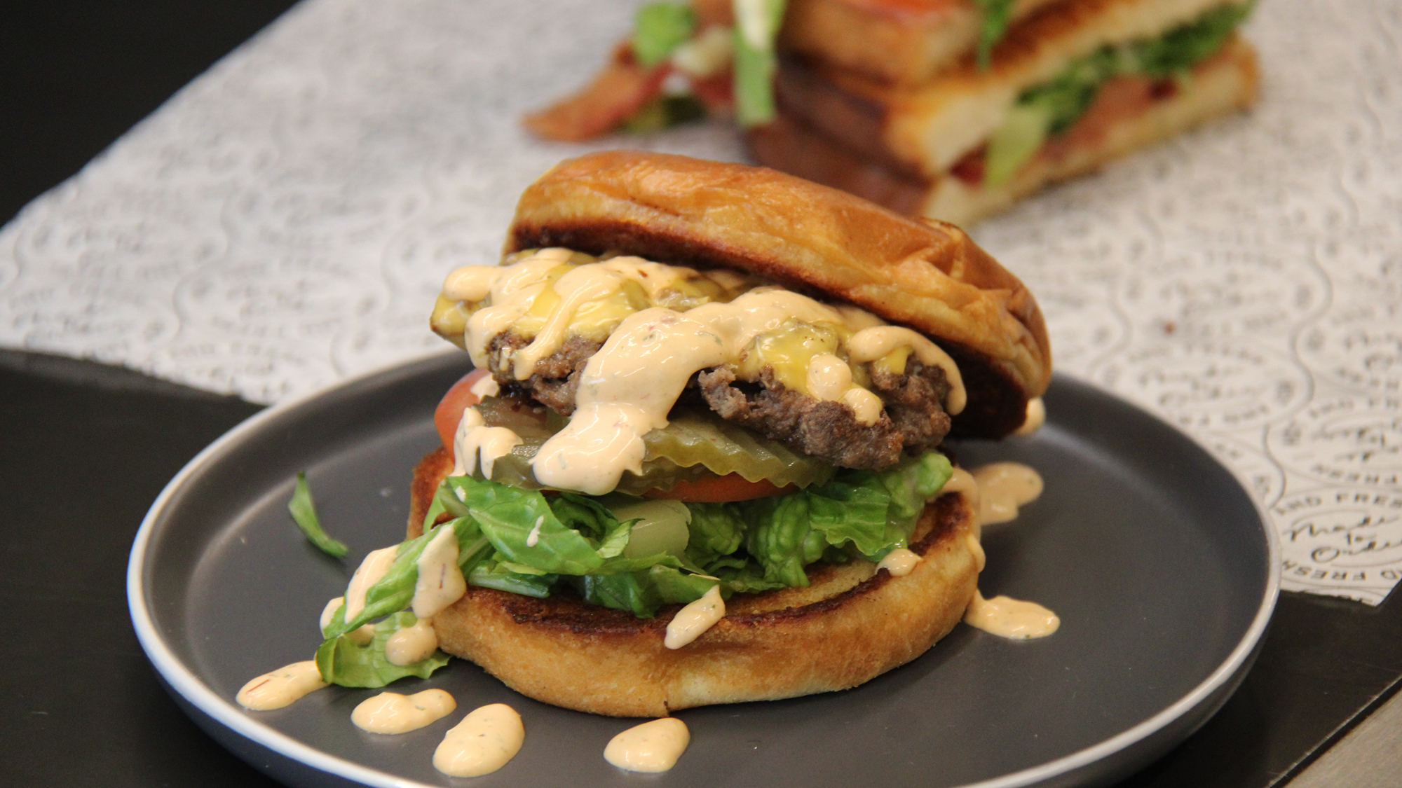 Burger with sauce and a sandwich