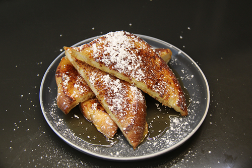 French Toast with powdered sugar and syrup