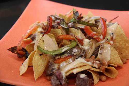 Nachos with steak and bell peppers