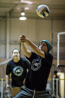 NPC student getting ready to hit a volleyball