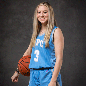 NPC Nighthawk Emily Teutsch in basketball jersey number 3 holding basketball
